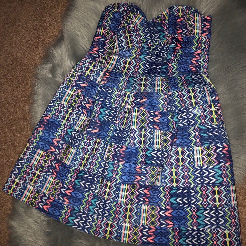 multi-colored strapless mini dress.